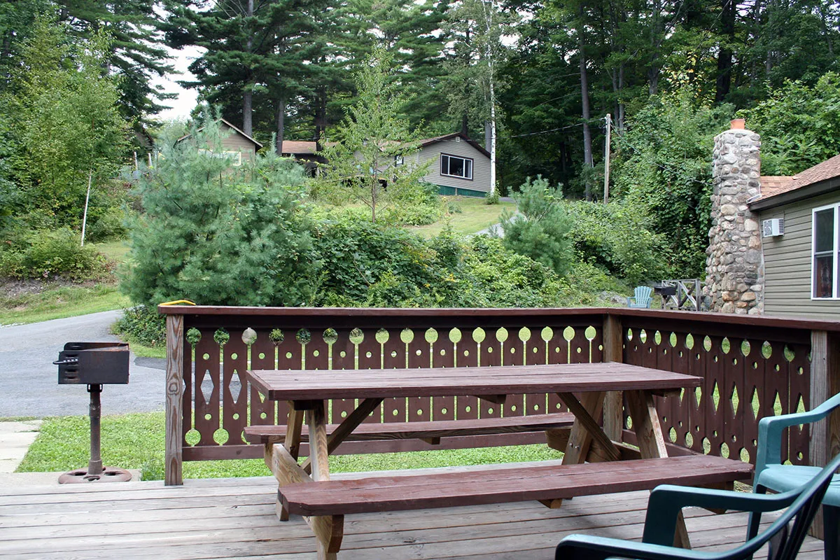 Relax on the deck of one of our hillside cottages